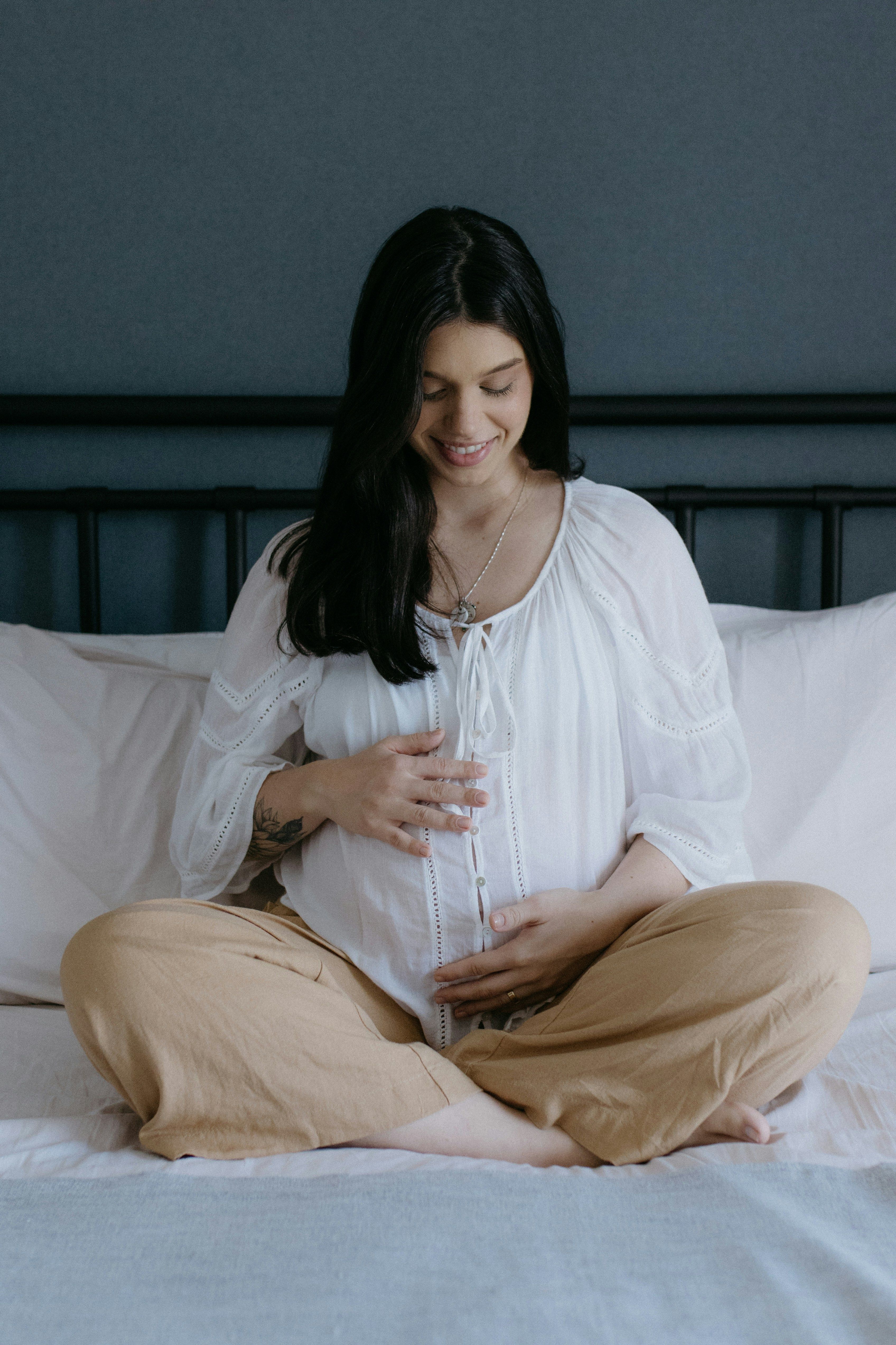 Pregnant woman checking blood sugar levels as part of gestational diabetes care